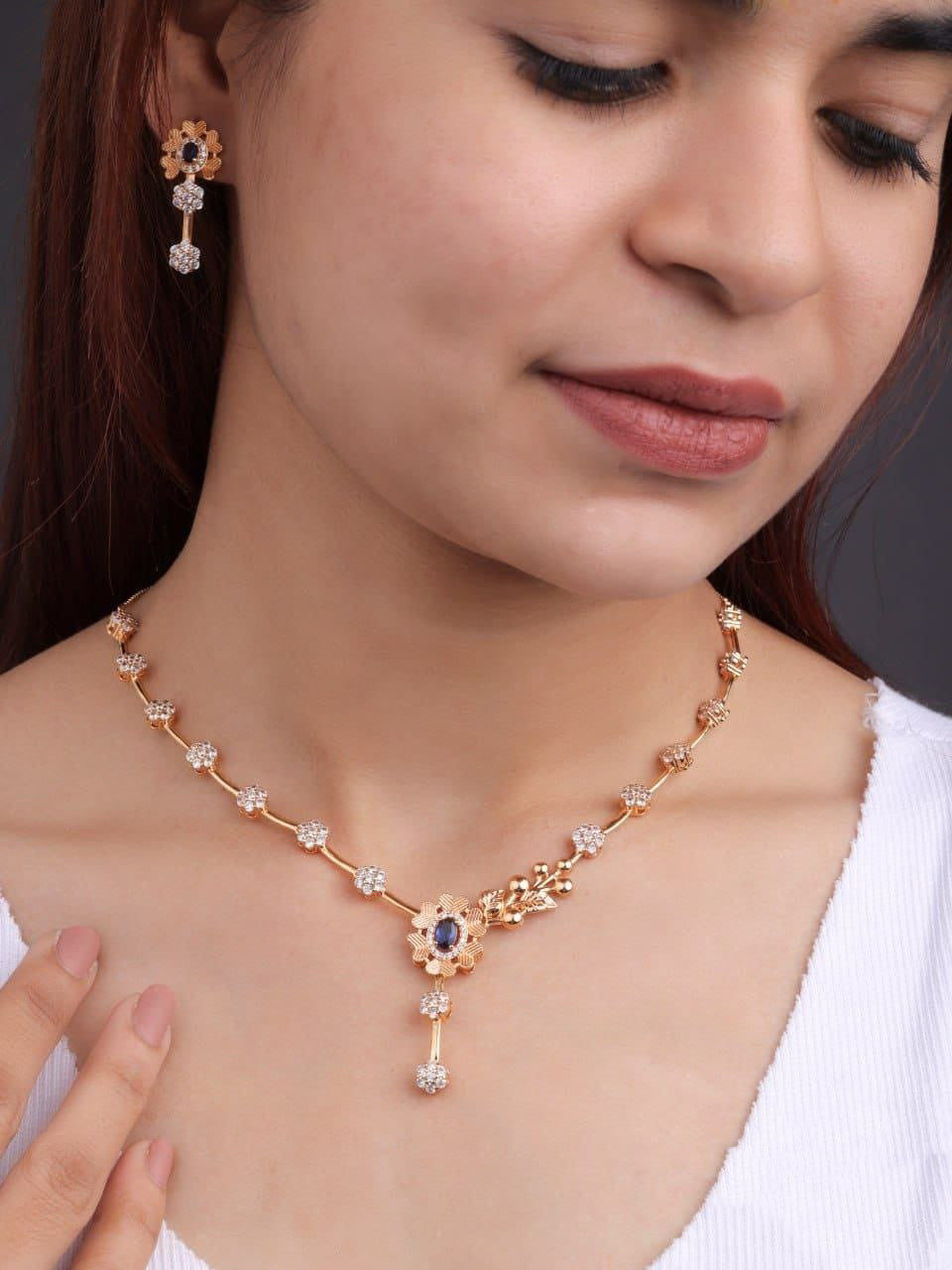 Flower with Blue Stone Studded Rose Gold Necklace