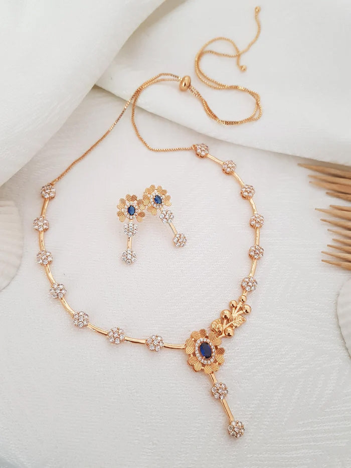 Flower with Blue Stone Studded Rose Gold Necklace